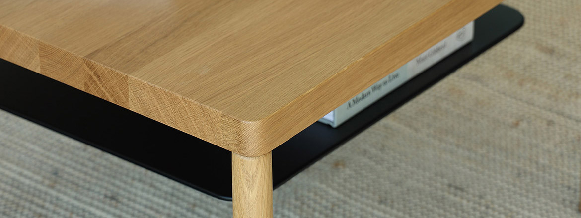 Lubo Majer for Take me HOME – Aldo coffee table detail, solid oak tabletop with rounded corner and black metal shelf